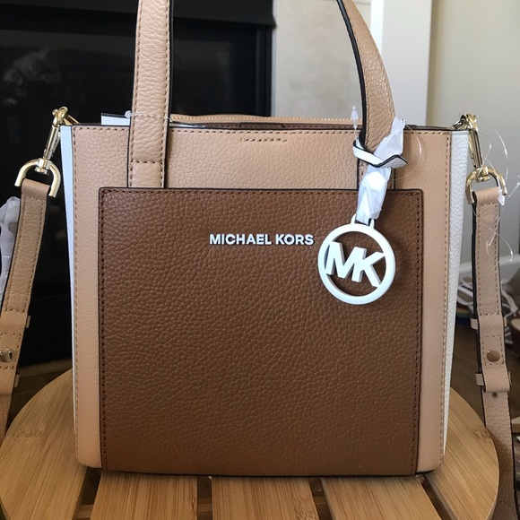 Michael Kors Handbags - NWT Michael Kors Gemma small messenger authentic
